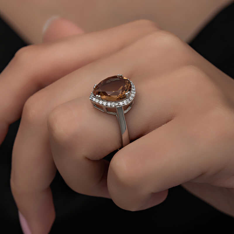 Sterling Silver Zultanite Pear-Cut Halo Ring - Statement Elegance