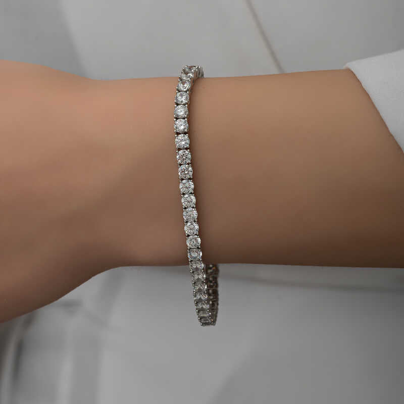 Pulsera Estilo Tenis - Elegancia Plateada con Deslumbrantes Piedras Blancas