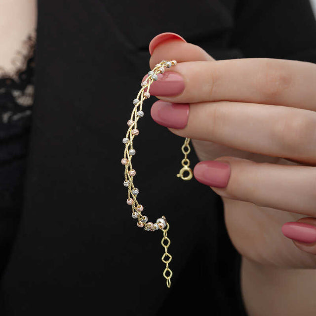 Bracelet - Gold-Tone Delicate Multi-Tone Dorika Beaded Twist Design