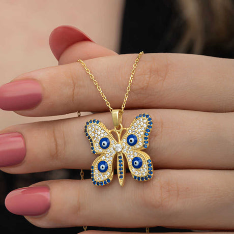 Gold-Tone Butterfly Evil Eye Necklace - Sparkling Clear & Blue Stones
