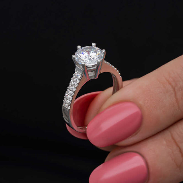Elegant Solitaire Ring - Sterling Silver with Pavé Band