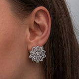 Sparkling Zirconia Flower Stud Earrings - Elegant Sterling Silver Design
