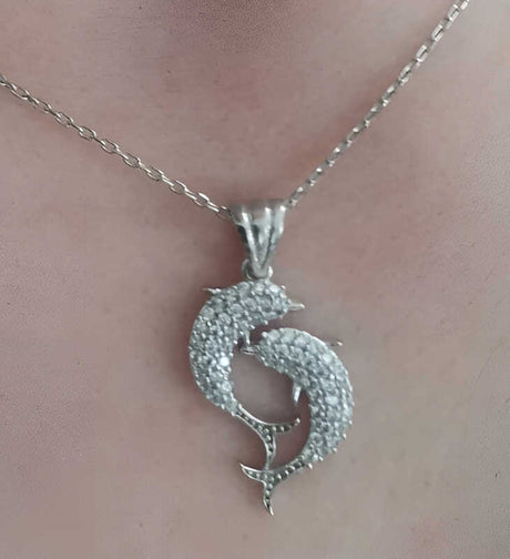 Sterling Silver Dolphin Embrace Necklace - Sparkling Cubic Zirconia