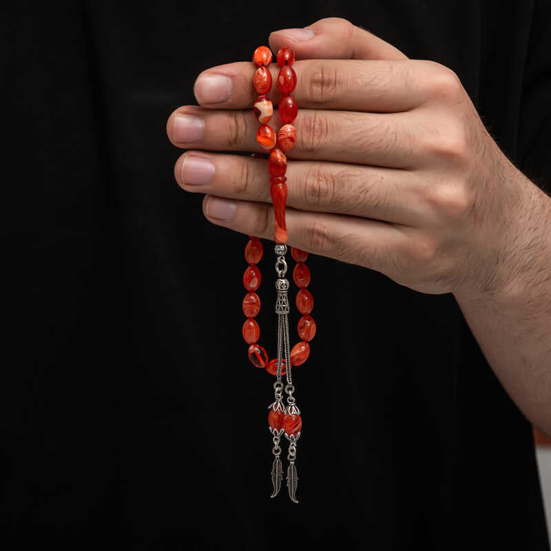 Gebedskralen - Rood Gemarmerde Sıkma Kehribar met Zilveren Kwast
