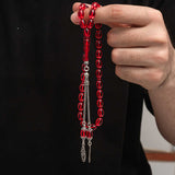 Elegant Tesbih - Red Compressed Amber Beads with Sterling Silver Tassel