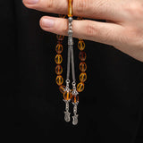 Tesbih Gebetskette - Sıkma Kehribar mit elegantem silbernem Quastenanhänger