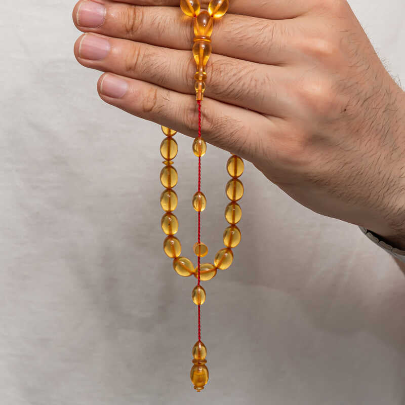 Tesbih - Elegant Amber-Like Prayer Beads with Red String Design
