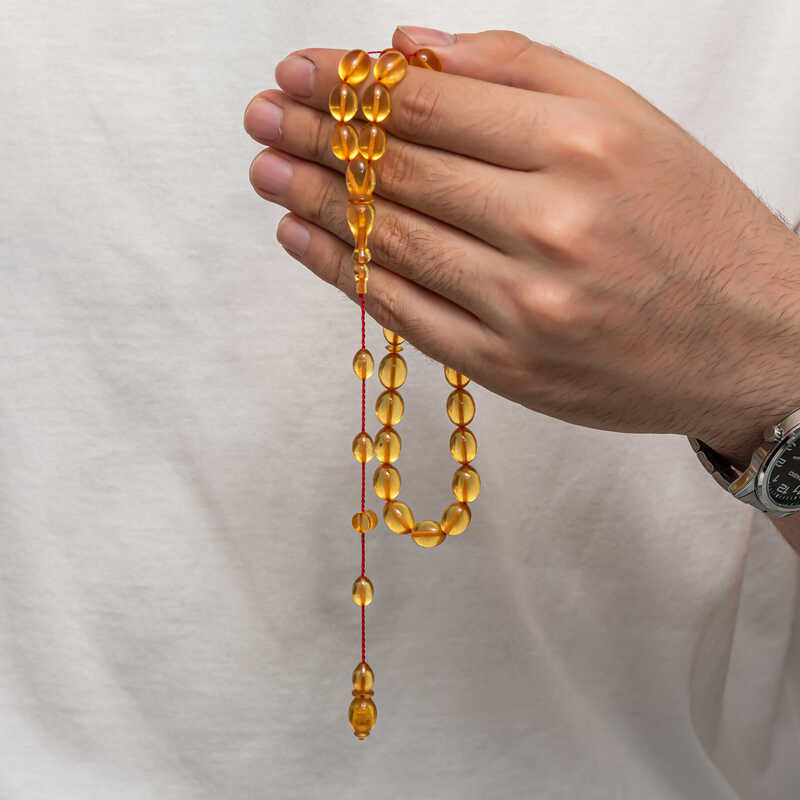 Tesbih - Elegant Amber-Like Prayer Beads with Red String Design