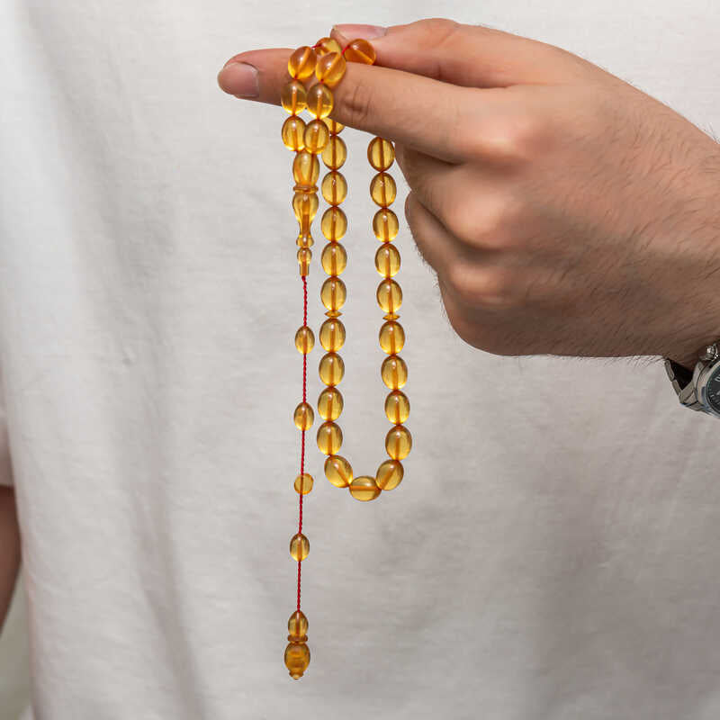Tesbih - Elegant Amber-Like Prayer Beads with Red String Design