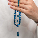 Tesbih - hluboce modré stlačené jantarové modlitební korálky, leštěný design