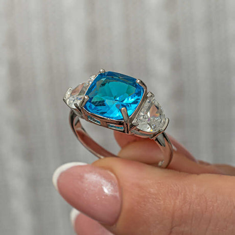Sterling Silver Three-Stone Ring - Cushion Blue Zircon & Clear Accents
