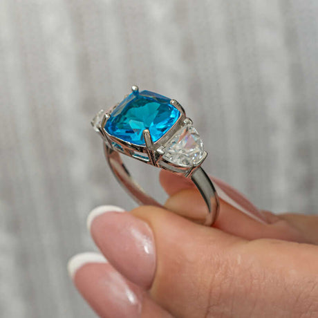Sterling Silver Three-Stone Ring - Cushion Blue Zircon & Clear Accents