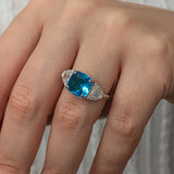 Sterling Silver Three-Stone Ring - Cushion Blue Zircon & Clear Accents