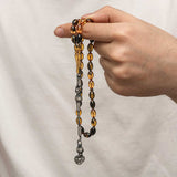 Chapelet artisanal - Ambre pressé bicolore avec pompon Kazaz en argent sterling