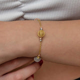 Bracciale con Perline Multitono in Finitura Oro - Design Dorika e Sfera Intrecciata