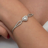 Armband van sterling zilver met zirconia hart en pavé schakels