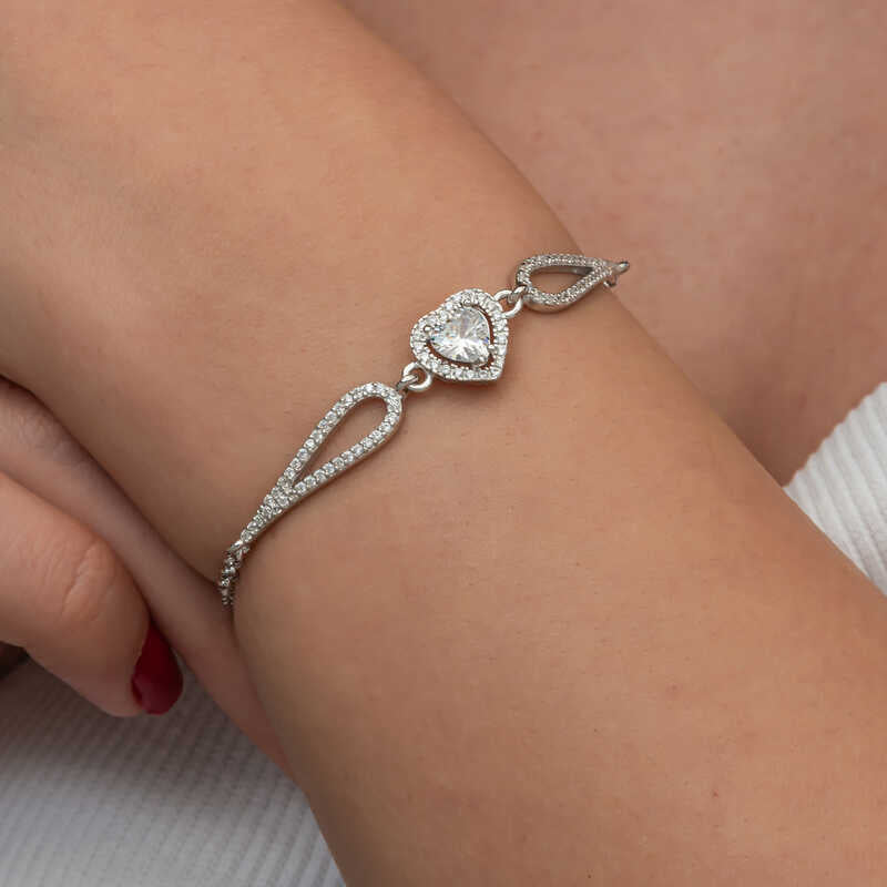 Armband van sterling zilver met zirconia hart en pavé schakels