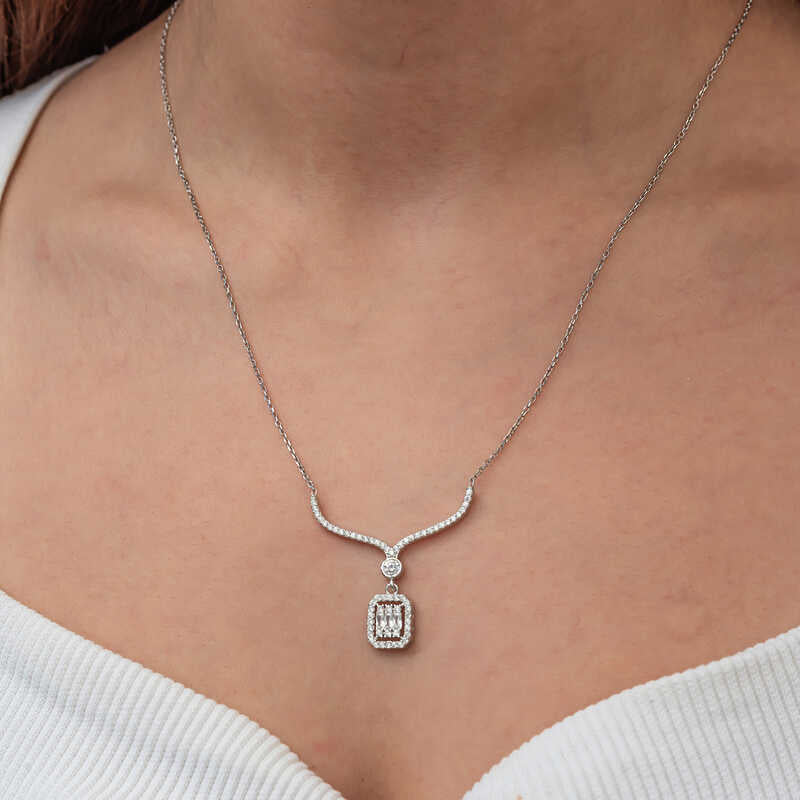 Halskette – Silberfarbene Baguette- und Rundschliff-Stein Y-Form