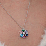 Ketting met hanger in sterling zilver-look met meerdere hartjes en bloem