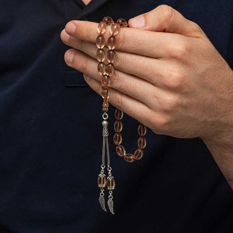 Tesbih Prayer Beads - Fire Amber with Sterling Silver Winged Tassel