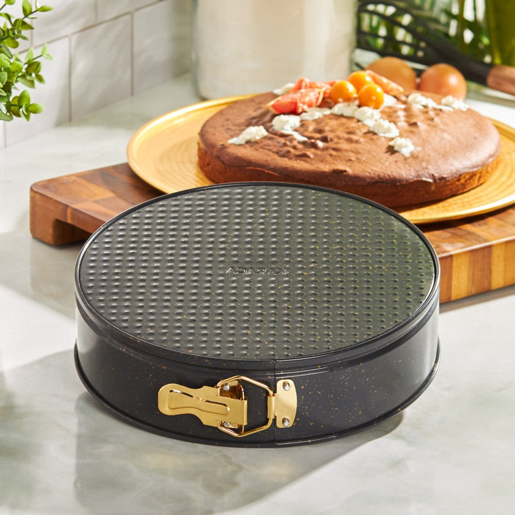 https://tryaladdin.com/cdn/shop/products/karaca-black-gold-springform-cake-pan-26-cm-413776_1024x1024.jpg?v=1693469111