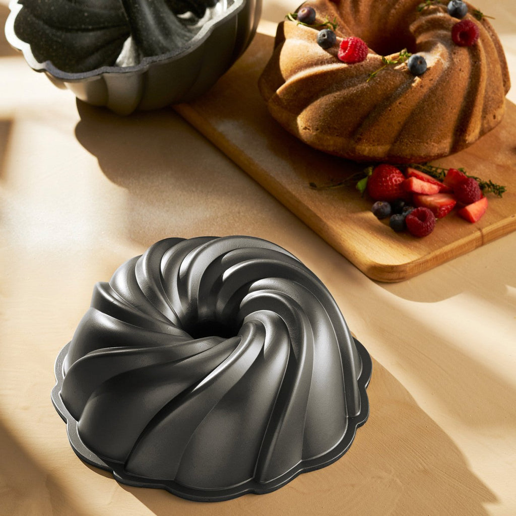 https://tryaladdin.com/cdn/shop/products/new-emsan-easy-release-cake-mold-418458_1024x1024.jpg?v=1693552272